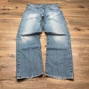 BEAUTIFULLY washed and distressed cremieux relaxed fit denim jeans